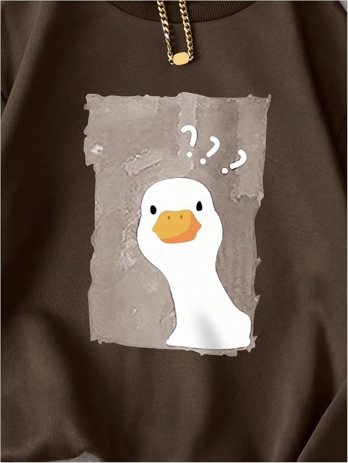 WDIRARA Women's Cartoon Duck Printed Crew Neck Sweatshirt Graphic Long Sleeve Loose Pullover